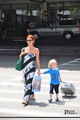 Poppy Montgomery arrives LAX airport with her son, Jackson (7/9/11) - poppy-montgomery photo