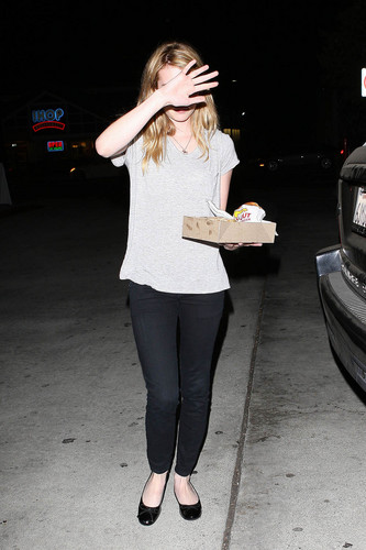 Emma Roberts grabs a burger at in-and-out in Hollywood, July 27. 