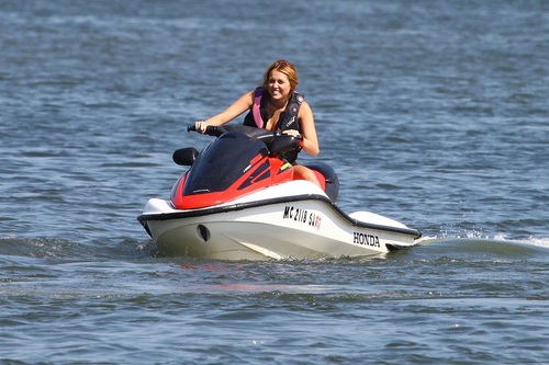  Miley - Enjoys a relaxing dia with friends in Orchard Lake, MI - July 31, 2011