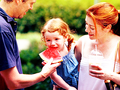 With the Family in a park - alyson-hannigan photo