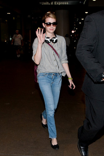  Emma Roberts is all smiles as she arrives at LAX