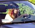 Miley Cyrus performs an illegal U-turn in West Hollywood. [August 9, 2011] - miley-cyrus photo