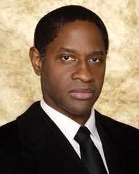 Before Voyager, Tim Russ appeared in what Star Trek movie?