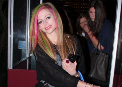 How does Avril feel before she get on stage for a concert?