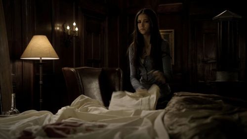 In 2x12 "The Decent" Elena puts a sick Rose to bed in Damon's room.What book does she notice on the bedside table?