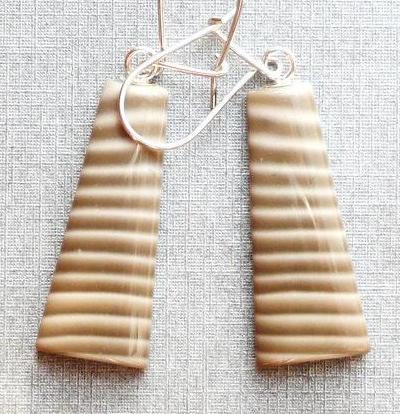  These earrings were made of...