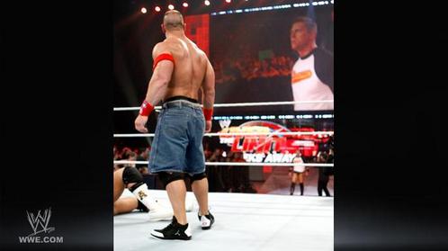 Who is John Cena looking at??