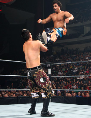 Which wrestler is about to land on The Miz???