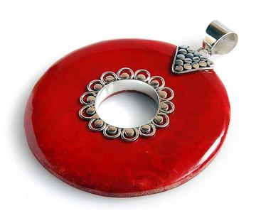  This pendant was made of Coral.