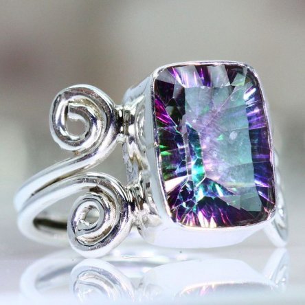  This ring was made of Mystic Topaz.