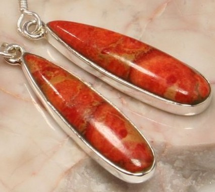  These earrings were made of Coral.