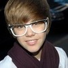 i have this poster in my room and i have glasses just like these but there blue! bieberlover952 photo
