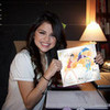 Selena with anime drawing! :D rosehedgehog222 photo
