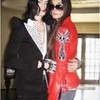 michael with russian designer for his new clothes this is it diamond6017 photo