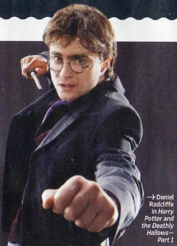  New DH promo. Harry in dress robes, wand at the ready.