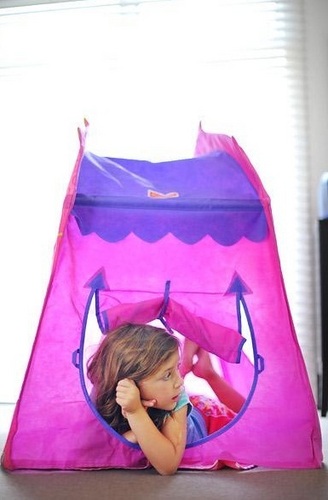  Renesmee playing in pop up tent