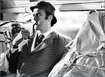  John Cleese as Sherlock Holmes