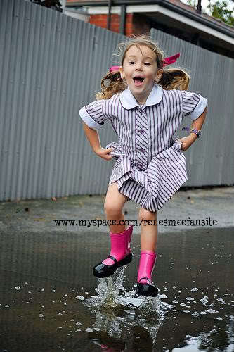  Renesmee jumping in the puddles