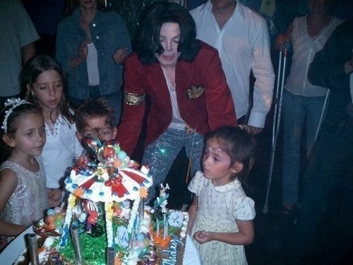  prince and paris with their daddy and friends