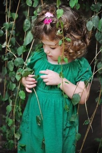  Renesmee playing in the CUllens garden