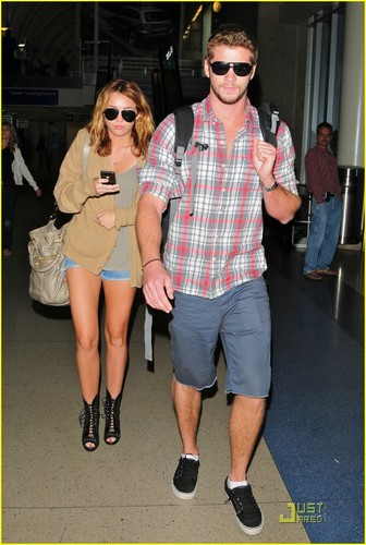  Miley Cyrus & Liam Hemsworth: LAX Landing