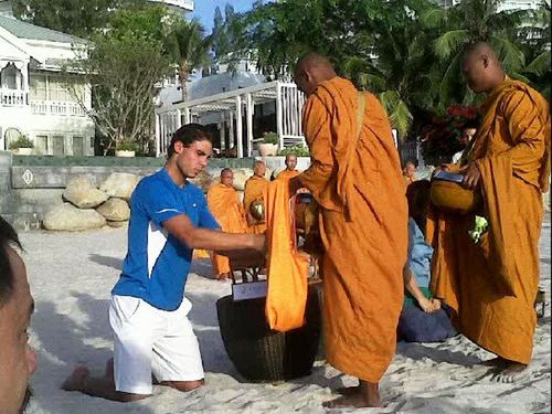 Rafa being blessed by Buddhist monks