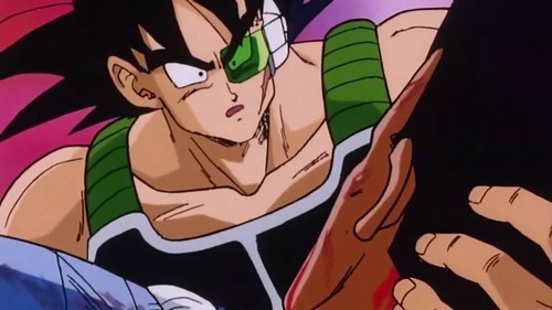  Bardock holding Toma in his arms.