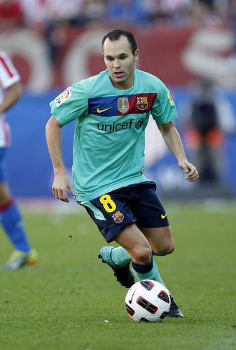 A. Iniesta playing for Barcelona