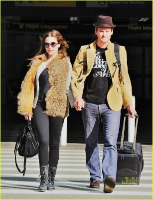  October 30th: arrive at LAX airport hand-in-hand in Los Angeles