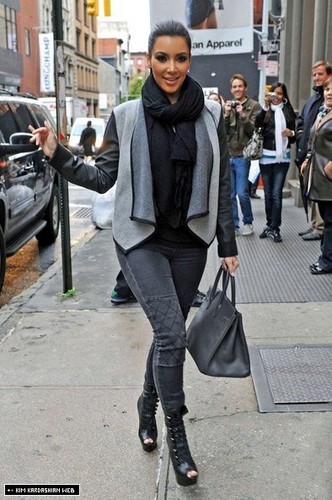  Kim is spotted with Kourtney in Soho, visiting their DASH store 11/8/10