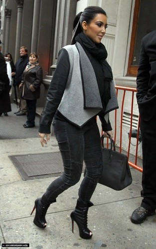  Kim is spotted with Kourtney in Soho, visiting their DASH store 11/8/10