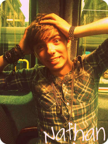  Nathan Holding his head Aww :) x