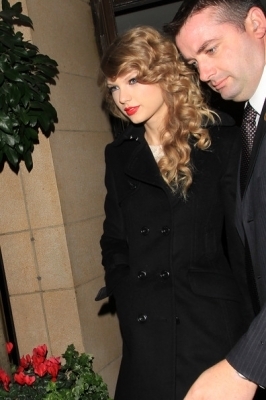  November 14 - Leaving her hotel in London, England