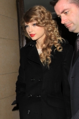  November 14 - Leaving her hotel in London, England
