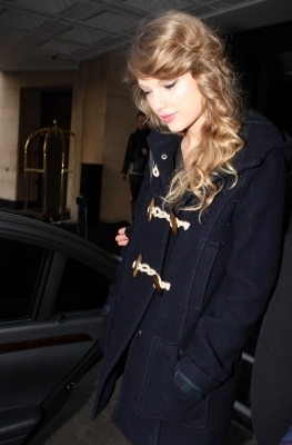 November 15 - Leaving her hotel in London, England