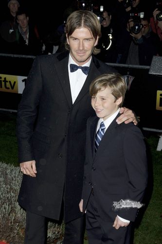  David and Brooklyn Beckham at A Night of নায়ক Dec 15 2010