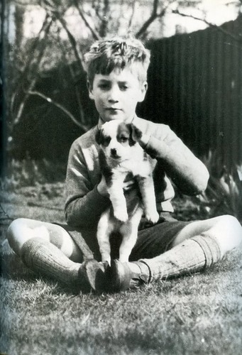 Adorable little John with an adorable little puppy