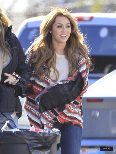  Miley on the set of her upcoming movie 'So Undercover' with her mom Tish in New Orleans on Decembe