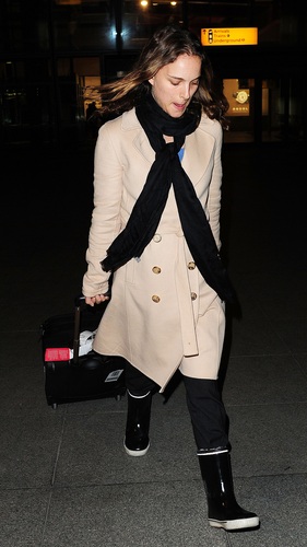  Natalie lands at Heathrow Airport, England
