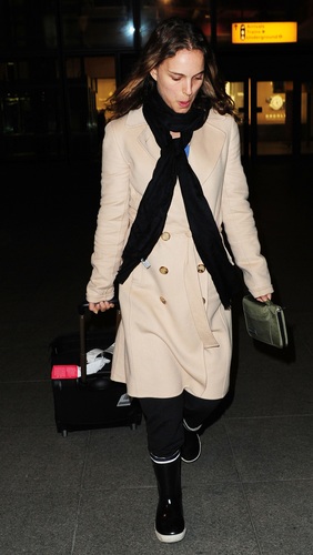  Natalie lands at Heathrow Airport, England
