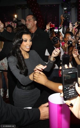  Kim and Khloe make an appearance at the Rand Club in South Africa 12/16/10