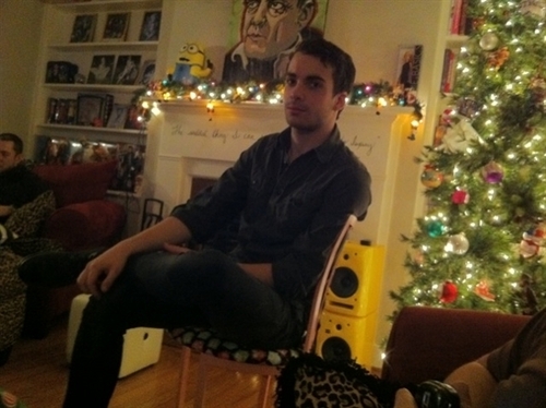 And here's Taylor watching wrestling at my house. It's Christmas-ey in here.