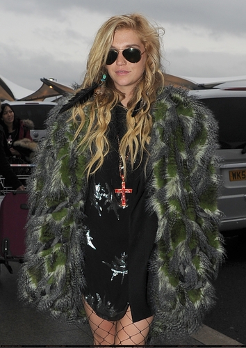  Ke$sha arriving at Heathrow Airport in London 12/16/10