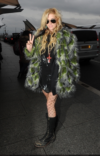 Ke$ha arriving at Heathrow Airport in London 12/16/10