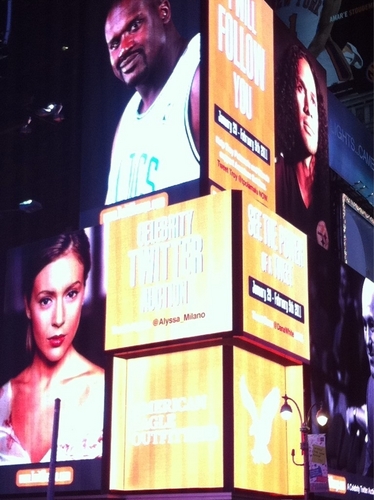  alyssa milano on time square for twitchange.com