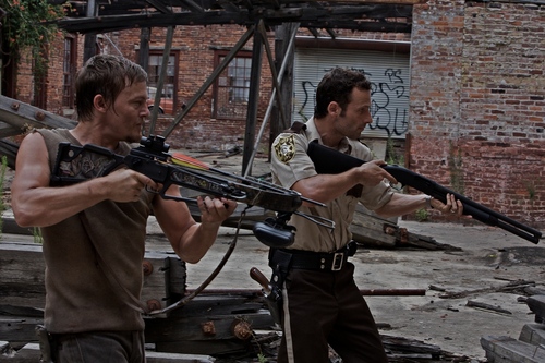  Daryl and Rick aiming.