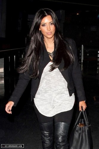  Kim is photographed arriving in New York at JFK airport 2/5/11
