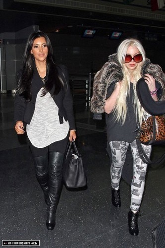  Kim is photographed arriving in New York at JFK airport 2/5/11