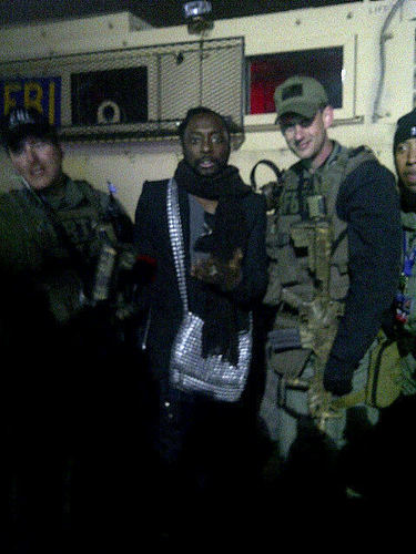  Will.i.am chilling with his security