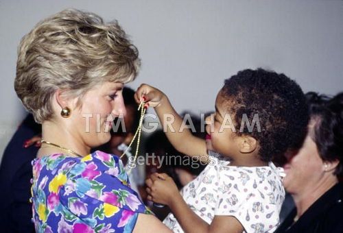  Diana Holding A Baby In Brazil